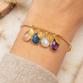 Personalized mom bangle bracelet with birthstone charms and engraved initial discs gold family jewelry gift