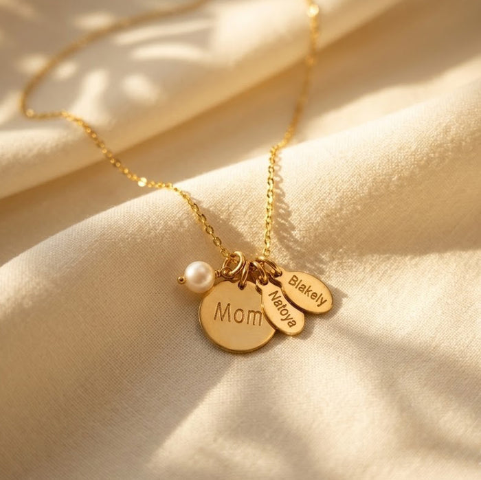 Gold filled mom necklace with freshwater pearl and oval children’s name tags