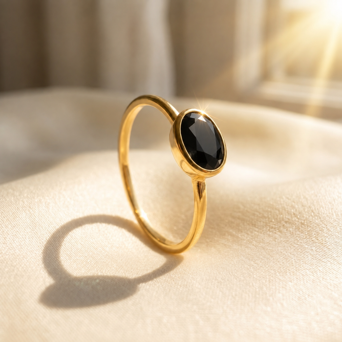 Small oval black onyx ring in yellow gold vermeil with bezel set gemstone