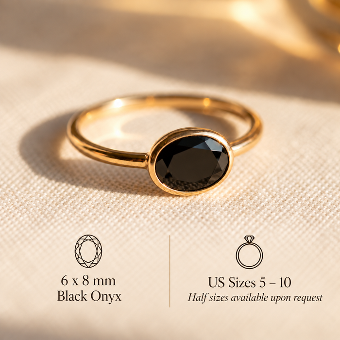 Black onyx oval bezel ring with slim stackable gold band