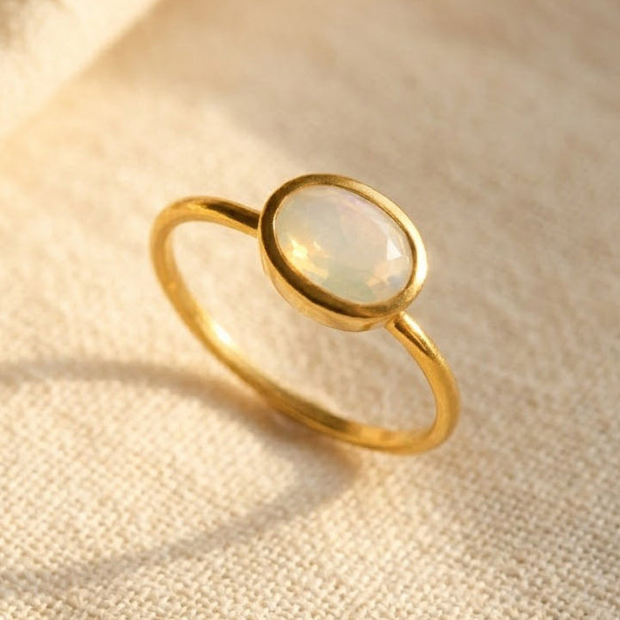 Faceted opalite ring in gold bezel setting minimalist October birthstone ring