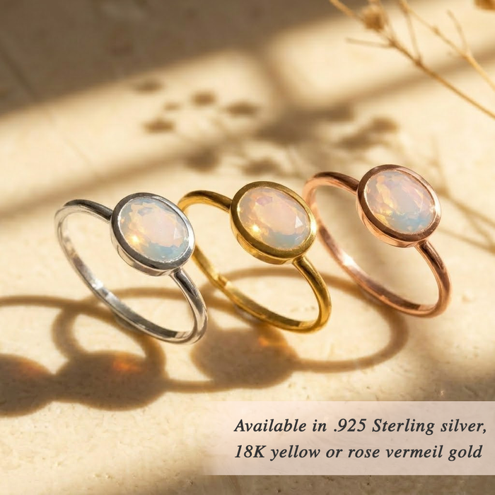 Gold faceted opalite ring with oval gemstone minimalist design
