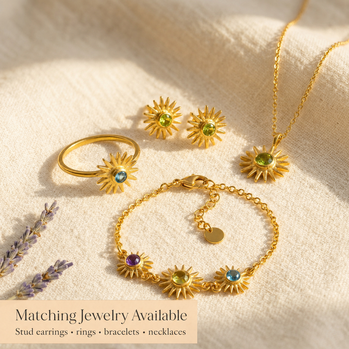 Matching birthstone jewelry set with a tiny necklace, ring, and bracelet displayed together as personalized gemstone gift options.