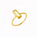 Gold filled tiny gemstone adira bar ring with citrine birthstone on white background. November birthstone, november birthday.