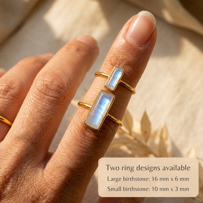 Two moonstone bar rings stacked on a finger with text showing large 16mm x 6mm and small 10mm x 3mm ring designs.