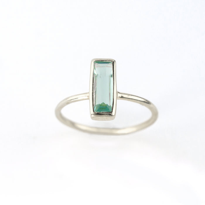 Sterling silver tiny blue topaz rectangle ring rectangle birthstone rectangle gemstone on white background light blue ring blue ring bar ring