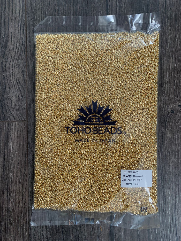 Toho Beads- Permanent Finish, Gold Glass beads non-fade (Toho PF557) Sizes 8/0 OR 11/0 1 pound