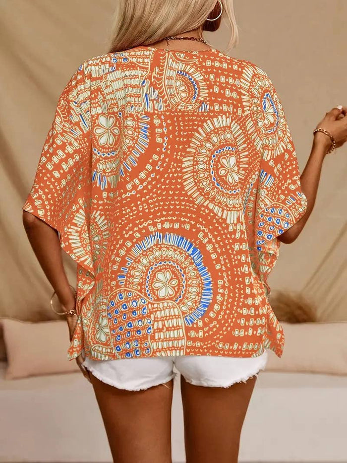 V-neck printed resort-style bat sleeved top