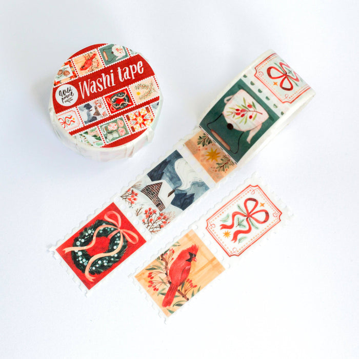 Decorative washi tape with various winter designs on a white background