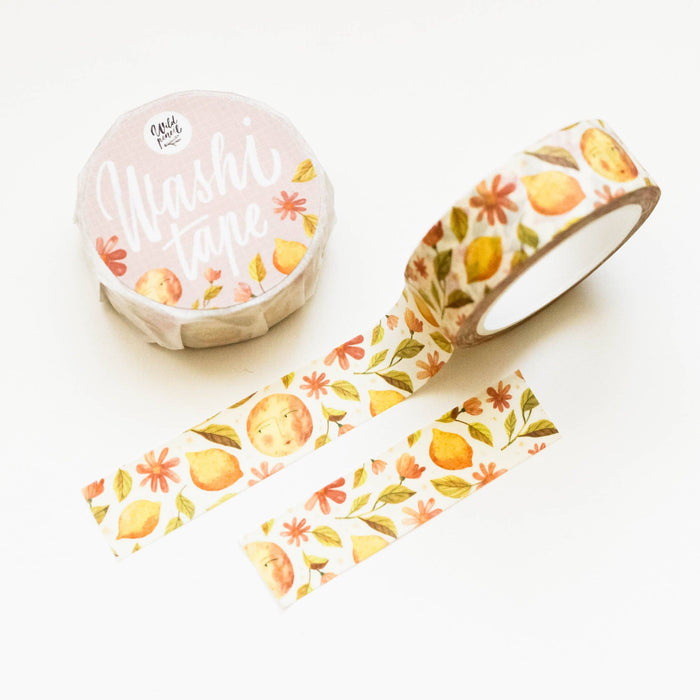 Decorative washi tape with lemon and floral design on a white background