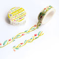Decorative washi tape with floral design on a white background