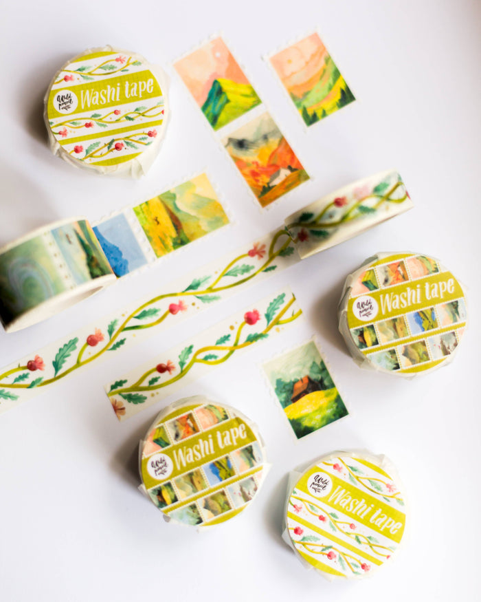 Set of colorful washi tape rolls with nature designs on a white background